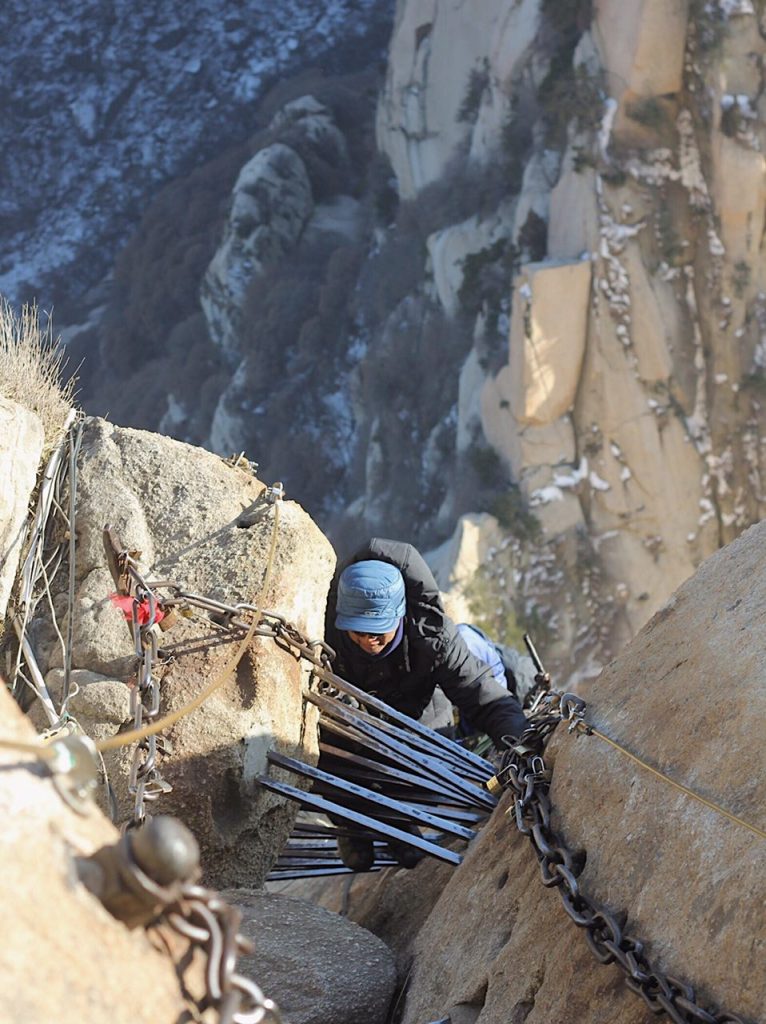 A ladder made from steel rods driven into a crack in the rock.