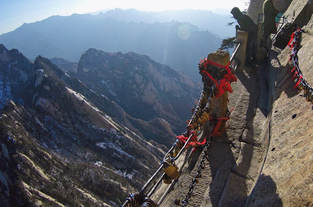 Getting into the Plank Walk In The Sky experience, with overlooking the mountains.