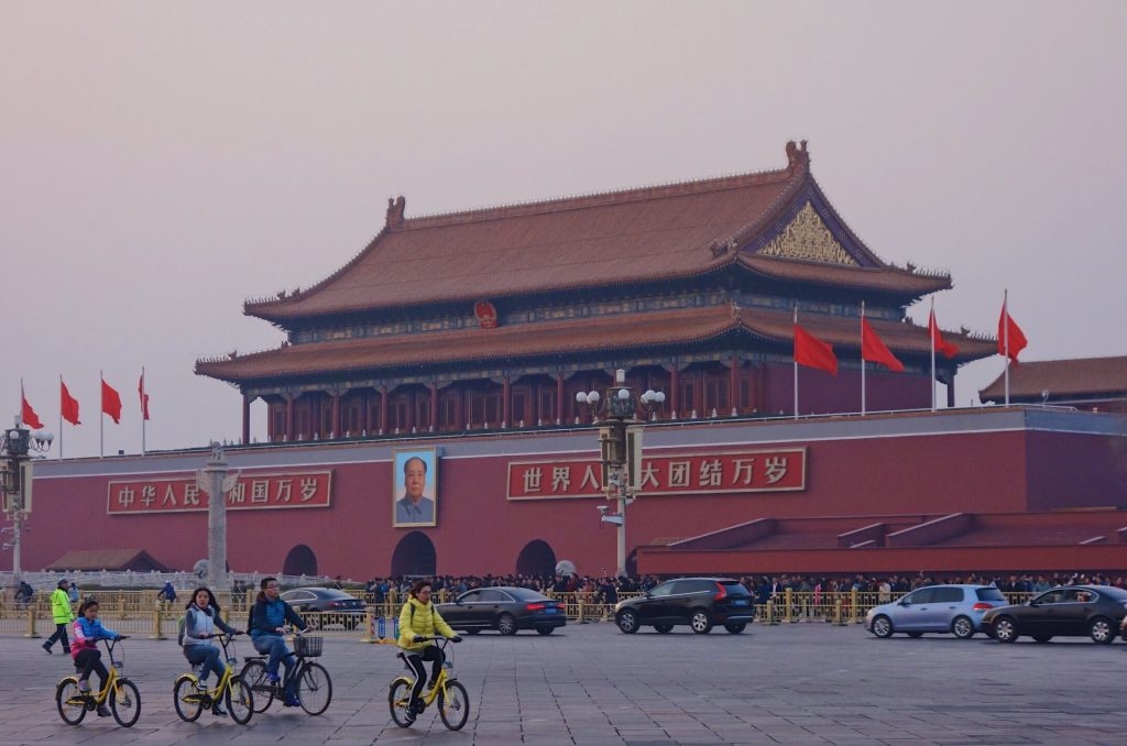 Tiananmen Square with an iconic portrait of Chairman Mao Zedong at the entrance of South Gate. Tiananmen Square, Beijing, March 2017.